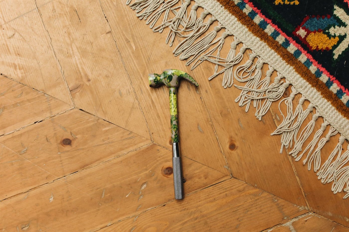 A tack hammer used for carpet stretching and edge work