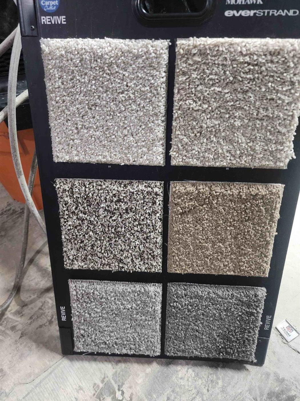 Flooring samples on a display board used for an in-home consultation